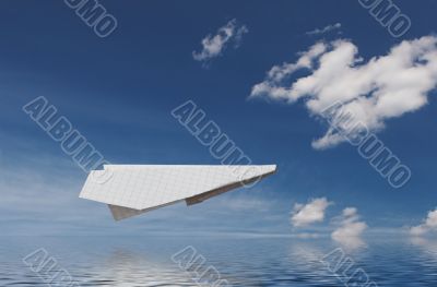 Paper plane above water