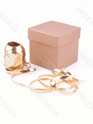 box with little stars and golden ribbon