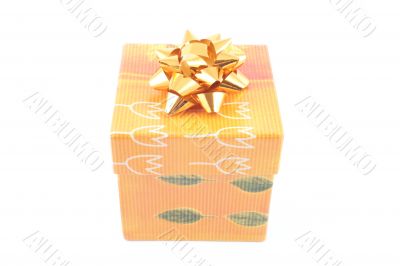 colorful box with golden ribon isolated