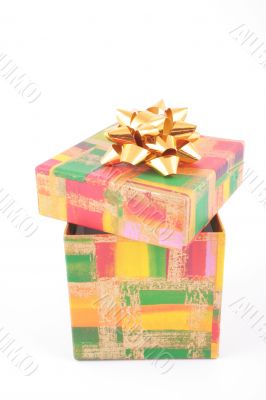 colorful box with golden ribon isolated