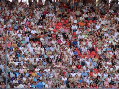 crowd of countless people spectators