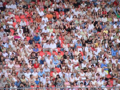 crowd of countless people spectators