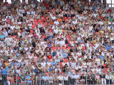 crowd of countless people spectators