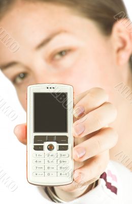 beautiful woman holding a white cell phone