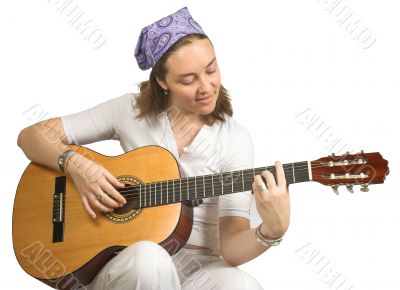 casual woman playing guitar