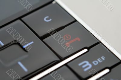 Close up shot of mobile keypad under light