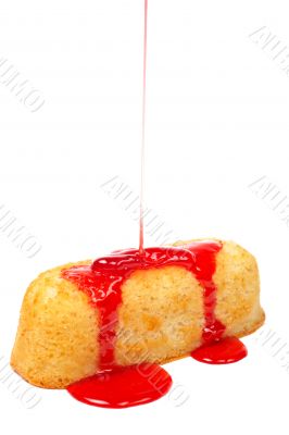 Strawberry syrup being poured