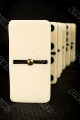 Domino chips on black