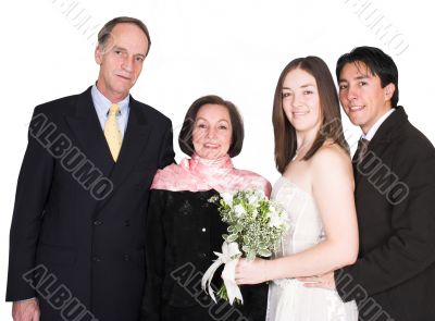 bride and groom with family