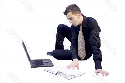 relaxed business man on the floor