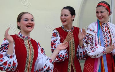 Group of ukrainian girls in national folk costumes