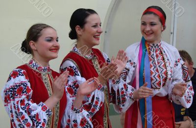 Group of ukrainian girls in national folk costumes