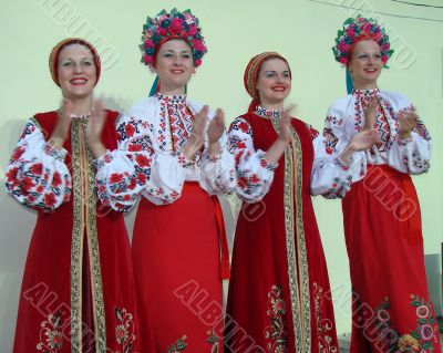 Group of ukrainian girls in national folk costumes