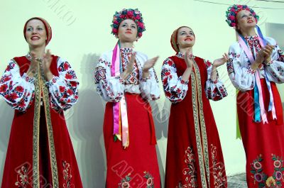 Group of ukrainian girls in national folk costumes