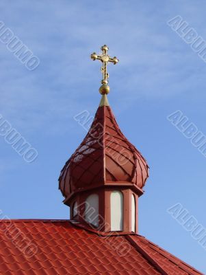 Orthodox Church with red Cupola with Holy Cross