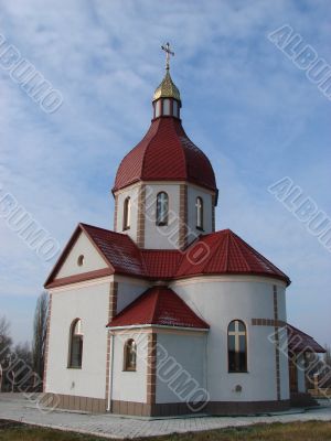 Orthodox Church with red Cupola with Holy Cross
