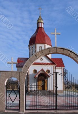Orthodox Church with red Cupola with Holy Cross