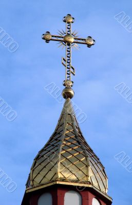 Orthodox Church`s Cupola Cross upon blue sky