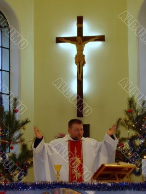 Roman catholic pastor praying inside dome