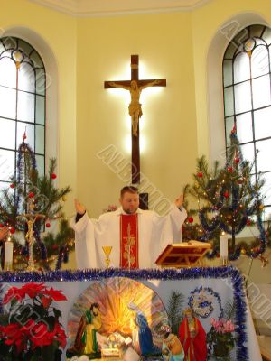 Roman catholic pastor praying inside dome