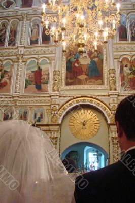 Wedding Couple inside old Orthodox Cathedral