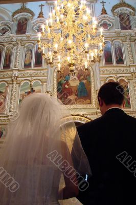 Wedding Couple inside old Orthodox Cathedral
