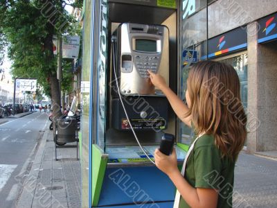 The girl calling by city phone