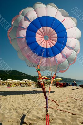parachute on sea beach