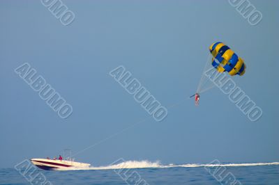 parasailing over sea