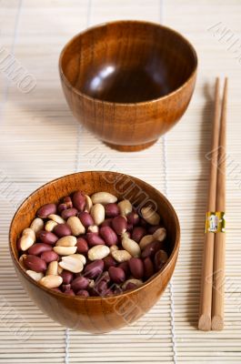 Two wooden noggins and chopsticks