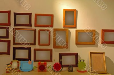 The photo frames on wall