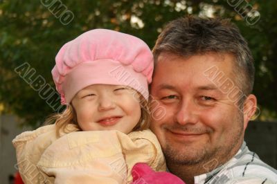 Smiling Father and daughter
