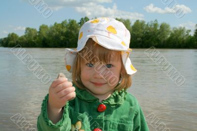 The girl ashore of river
