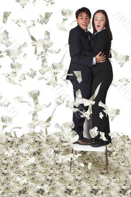 business couple with lots of money