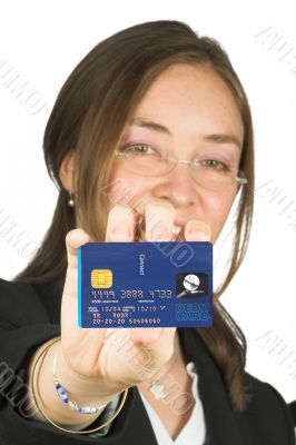 Business woman holding credit card up
