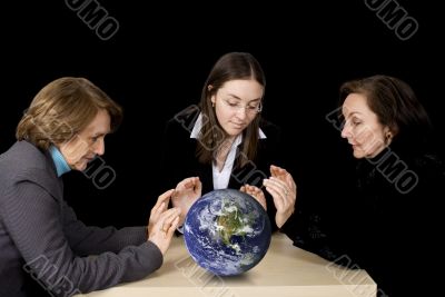 business team with globe over black
