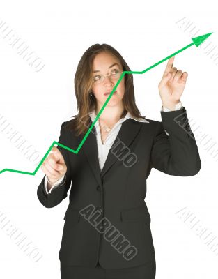 Business woman pointing at graph