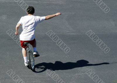 Boy on a unicycle