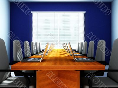 Laptops in an empty room