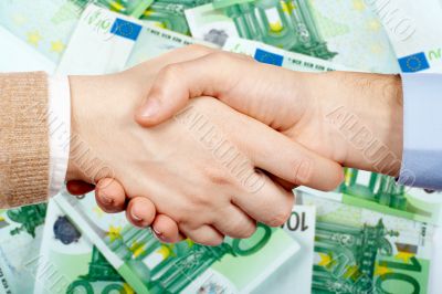 Handshake and money