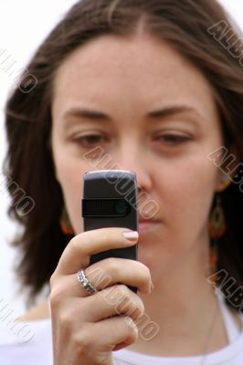 camera phone girl - focus on phone