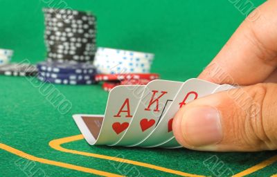 cards showing a royal flush