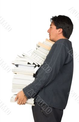 casual guy carrying books