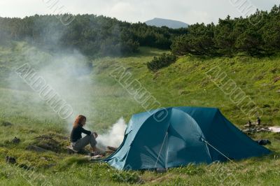 Girl near of a tent