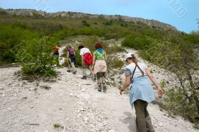 group of hikers going up