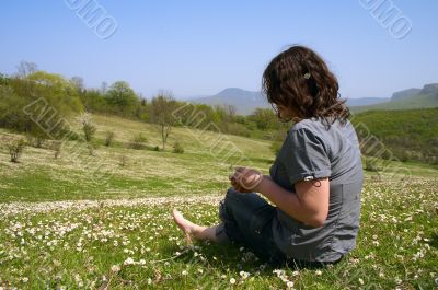 girl on  daisy flower