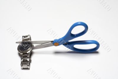 Cutting clok with scissors