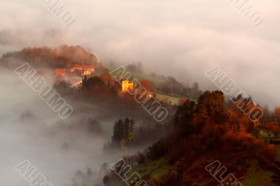 Houses between the fog