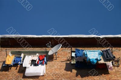Windows with washed clothes