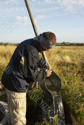 Man with bucket